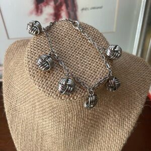 Elegant Silver Knot Charm Bracelet